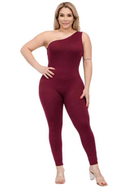 Plus size one shoulder jumpsuit in solid color with soft, stretchy jersey fabric, worn by model; trendy and comfy for casual wear.