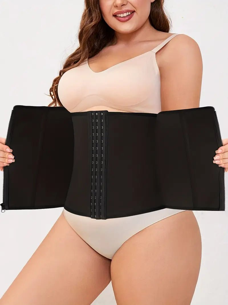 Woman wearing the Plus Size Tummy Control Zipper Hook & Eye Waist Trainer in solid black with slight stretch and a comfortable fit.