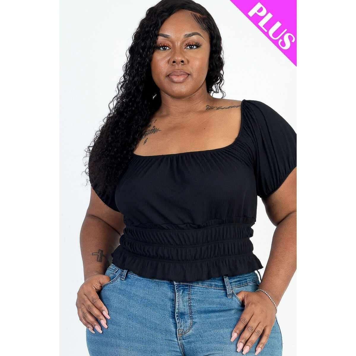 Plus size black blouse, curvy woman wearing stylish top with jeans, celebrating body diversity at Your Style Fashion.