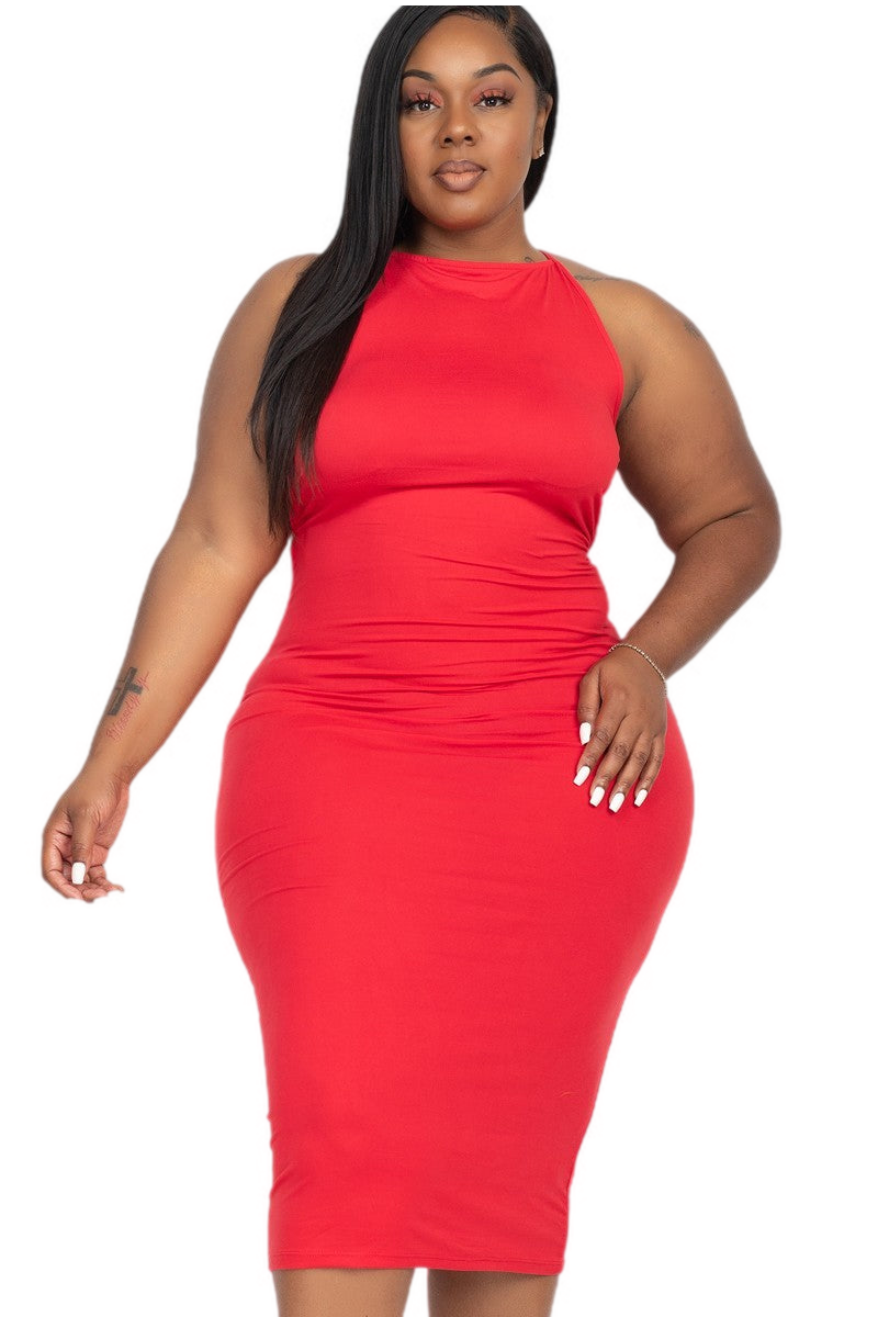 Plus size woman wearing a stylish red dress exuding confidence and elegance