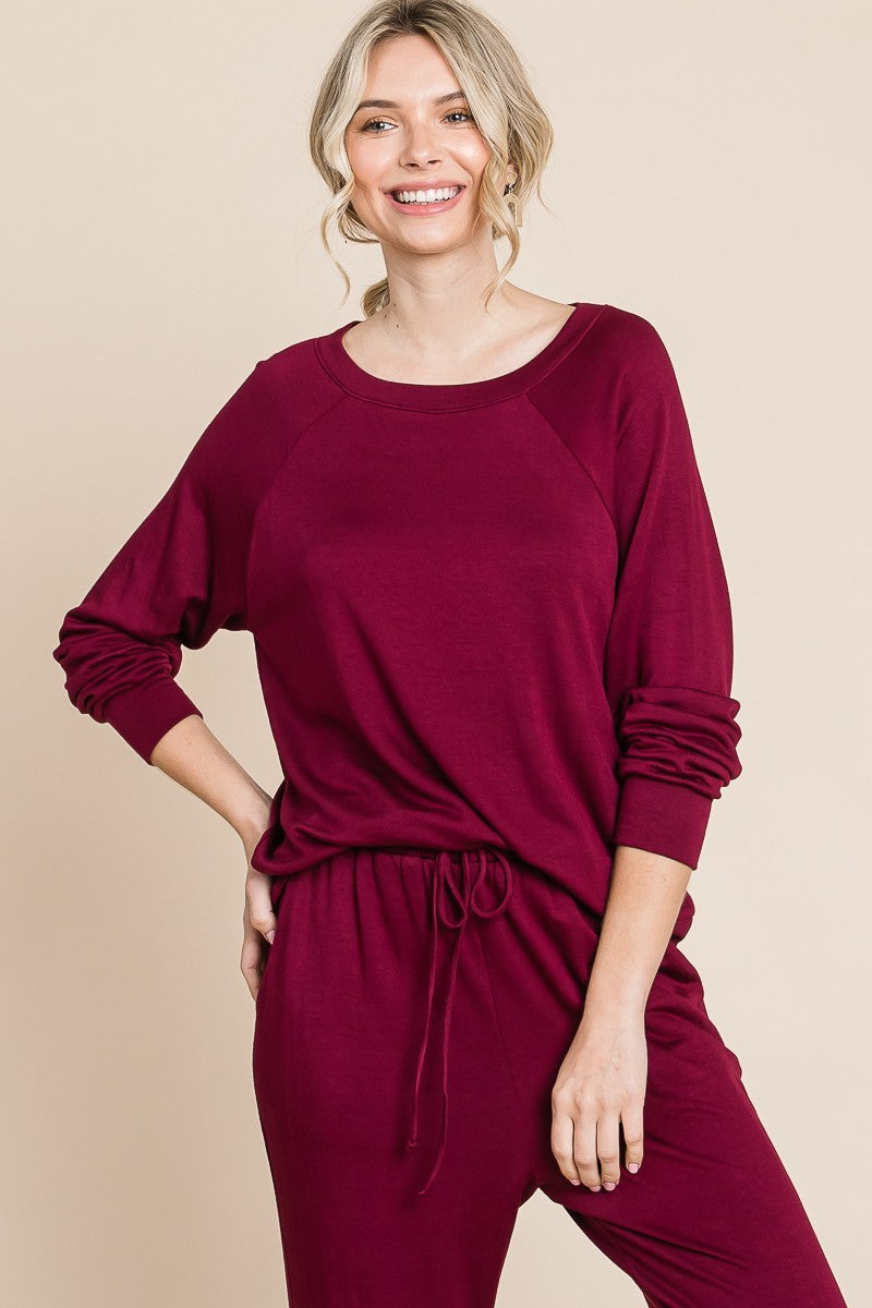 Burgundy round neck raglan sleeve top and pants lounge set, basic style, slightly stretchy fabric, comfortable two-piece outfit.