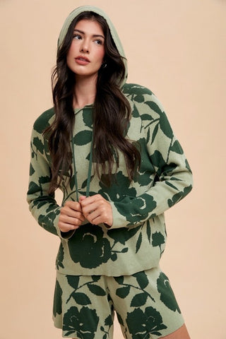 Woman wearing green flower pattern drawstring hooded top and shorts sweater set made of cotton and spandex, basic style.