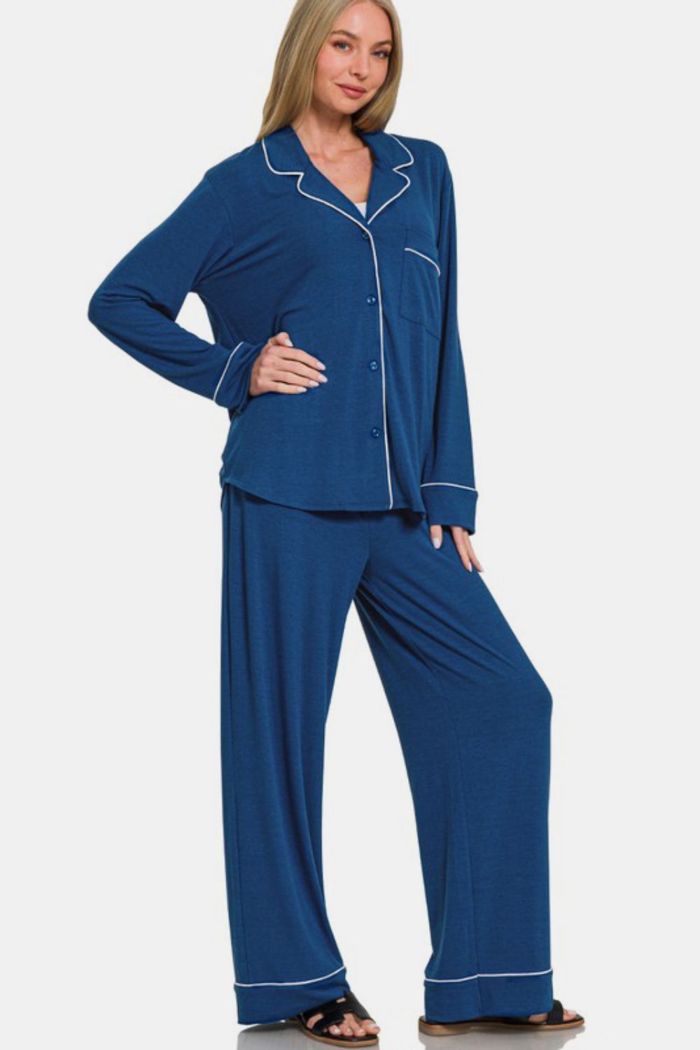 Peacock blue lounge set with button down long sleeve top and pants, featuring pockets and slight stretch, made of polyester-rayon-spandex blend.