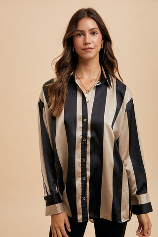 Striped dropped shoulder button-up shirt made of 100% polyester, featuring long sleeves and a basic style with opaque fabric.