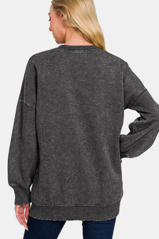 Woman wearing Zenana High-Low Acid Wash Fleece Sweatshirt in charcoal gray, showcasing the back view and modern high-low hemline.