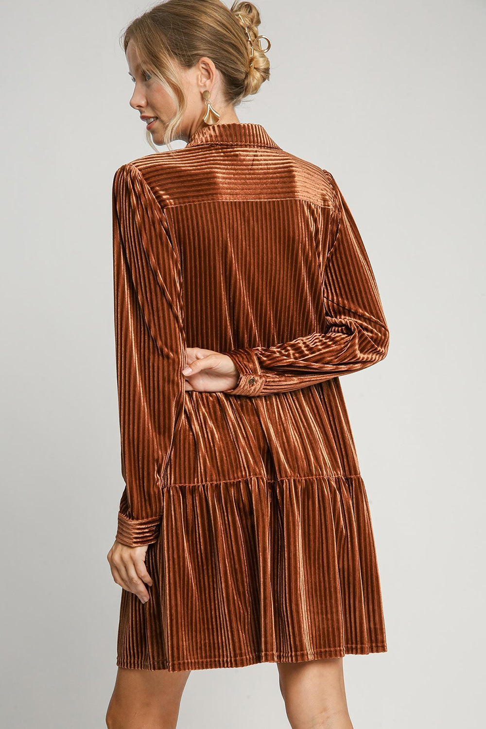 Copper texture tiered collared long sleeve dress with buttons and pockets, ruched design, slightly stretchy fabric, back view.