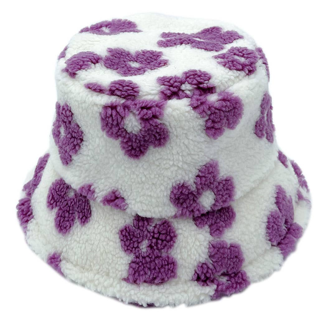 Winter Sherpa bucket hat with purple floral pattern, flat top, and cozy design, featuring adjustable inside strings.