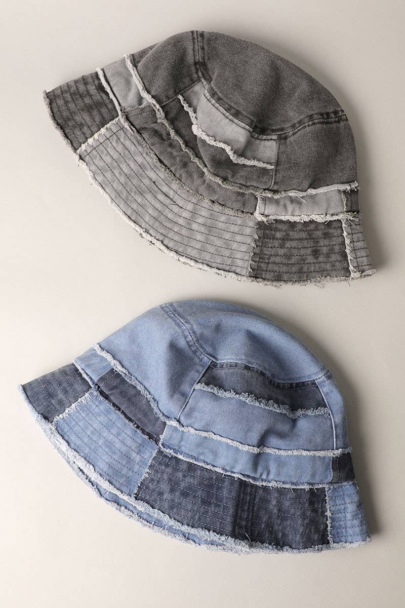 Frayed patchwork canvas denim bucket hats in multicolor with narrow brim, showcasing rustic design on a white background.