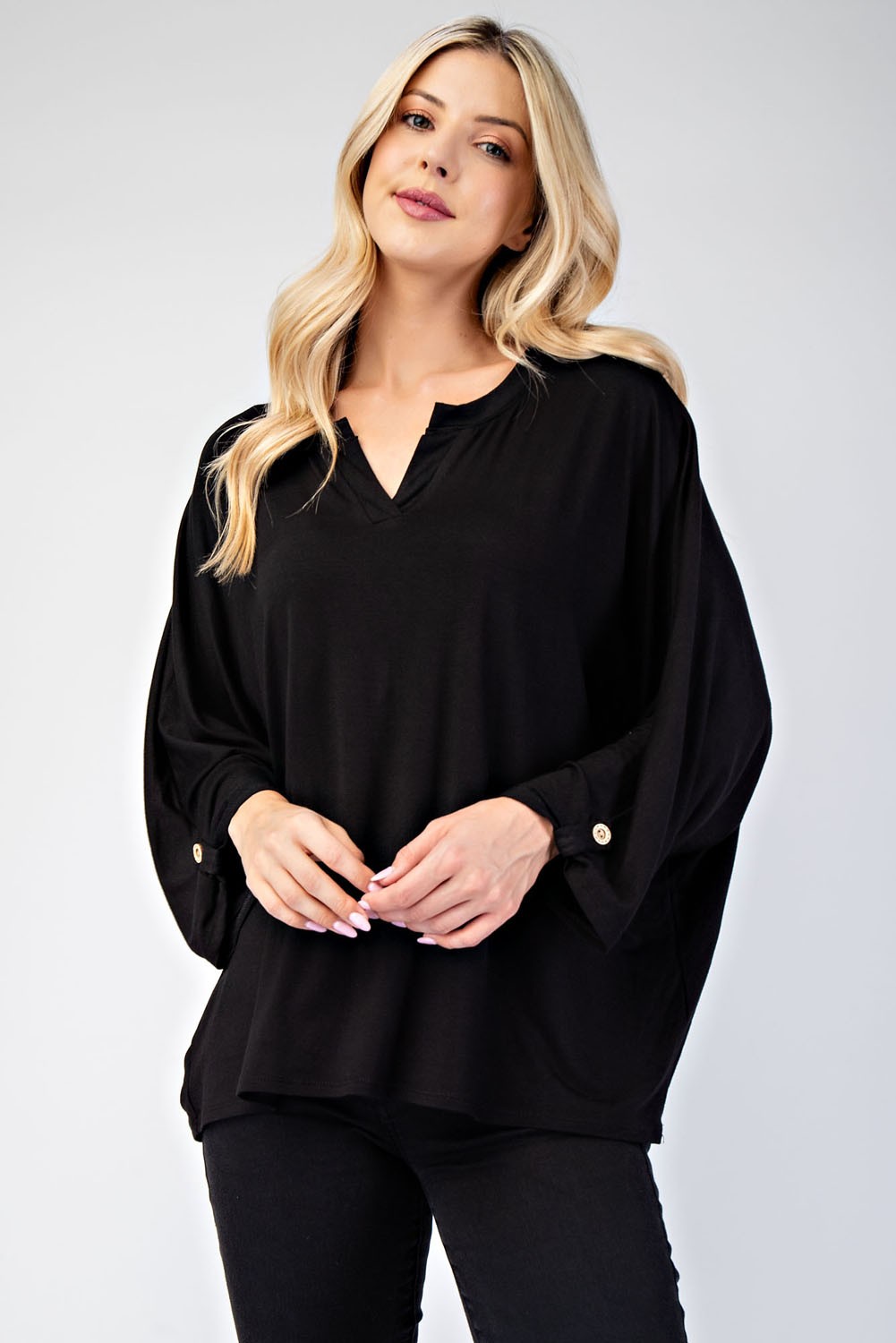 Black full-size notched blouse with three-quarter sleeves, made of 96% rayon and 4% spandex, slightly stretchy and opaque.