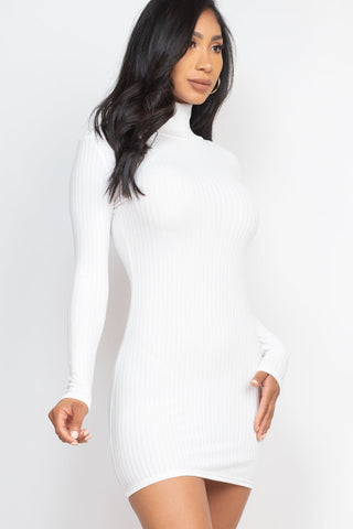 Woman wearing a white ribbed mock neck bodycon mini dress, showcasing the dress's fitted style and soft, lightweight knit fabric.