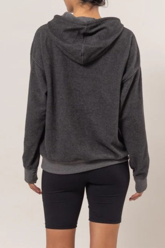 Charcoal brushed long sleeve hoodie with kangaroo pocket, featuring drawstring, and slight stretch for comfort and style.