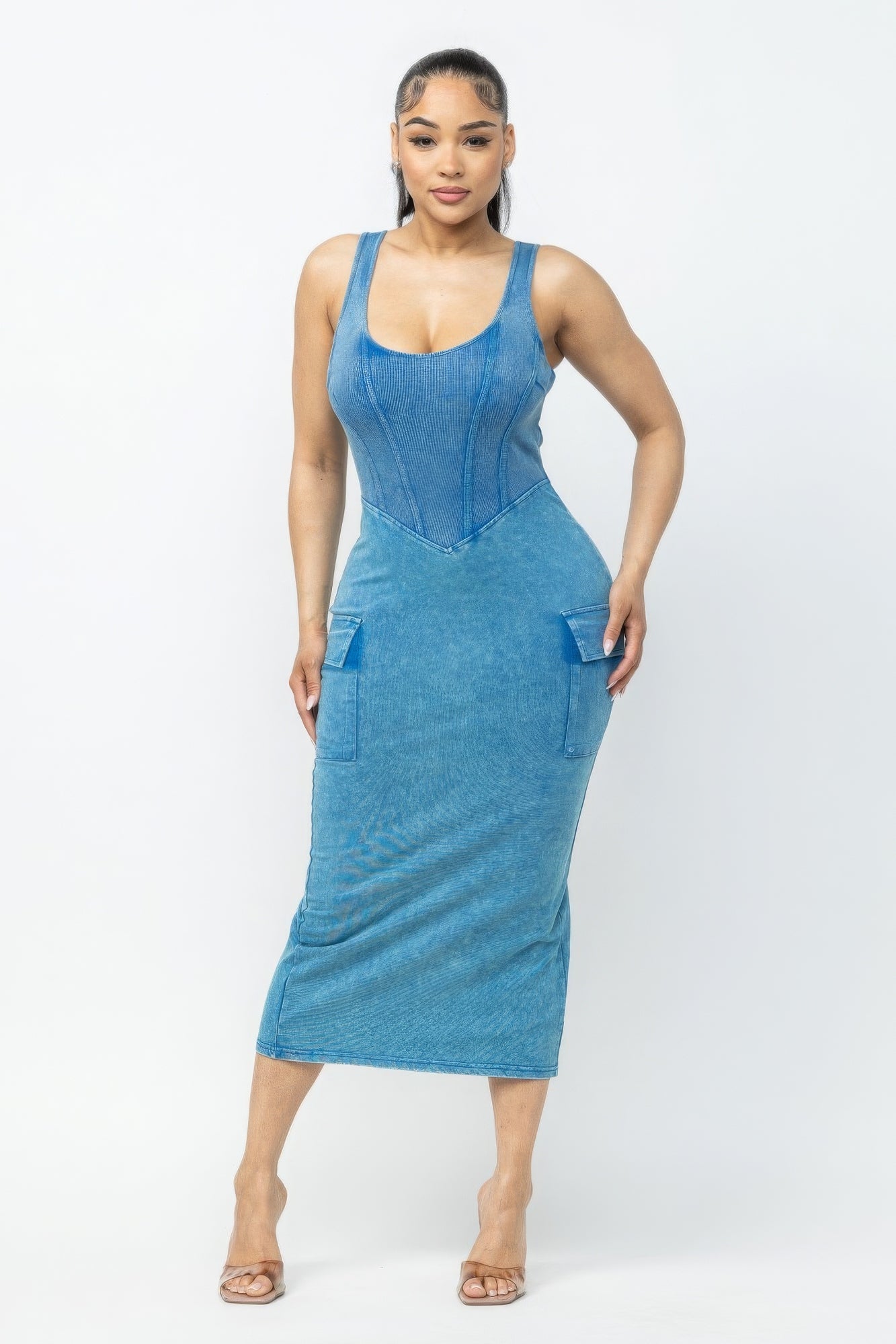 Blue acid washed cargo midi dress with trendy pockets, perfect fit, and edgy style for versatile wear.