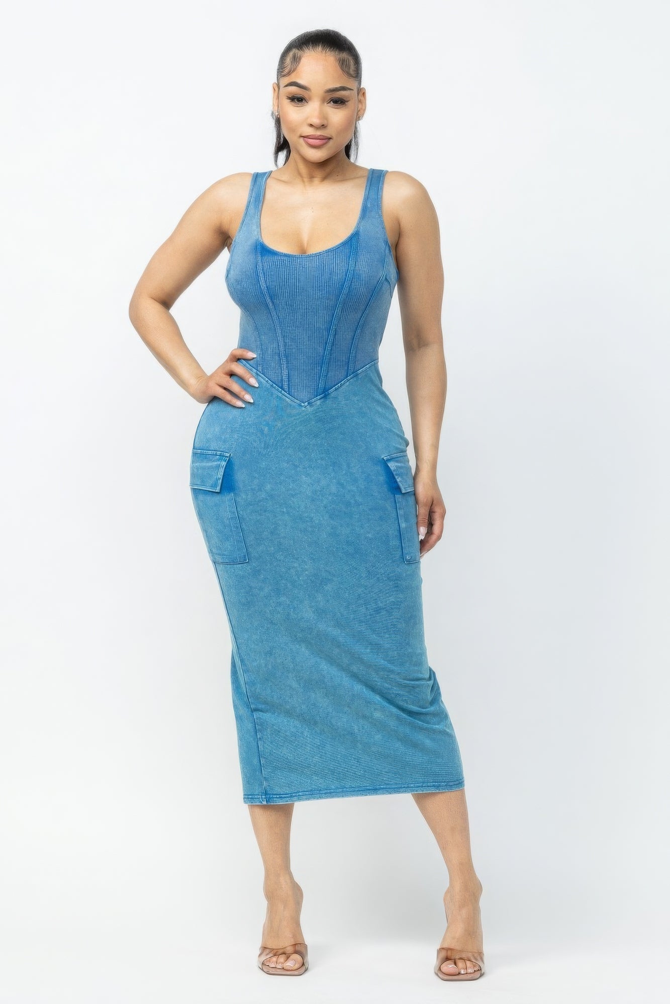 Acid washed blue cargo midi dress with edgy style and pockets, offering a bold look and comfortable fit for versatile wear.