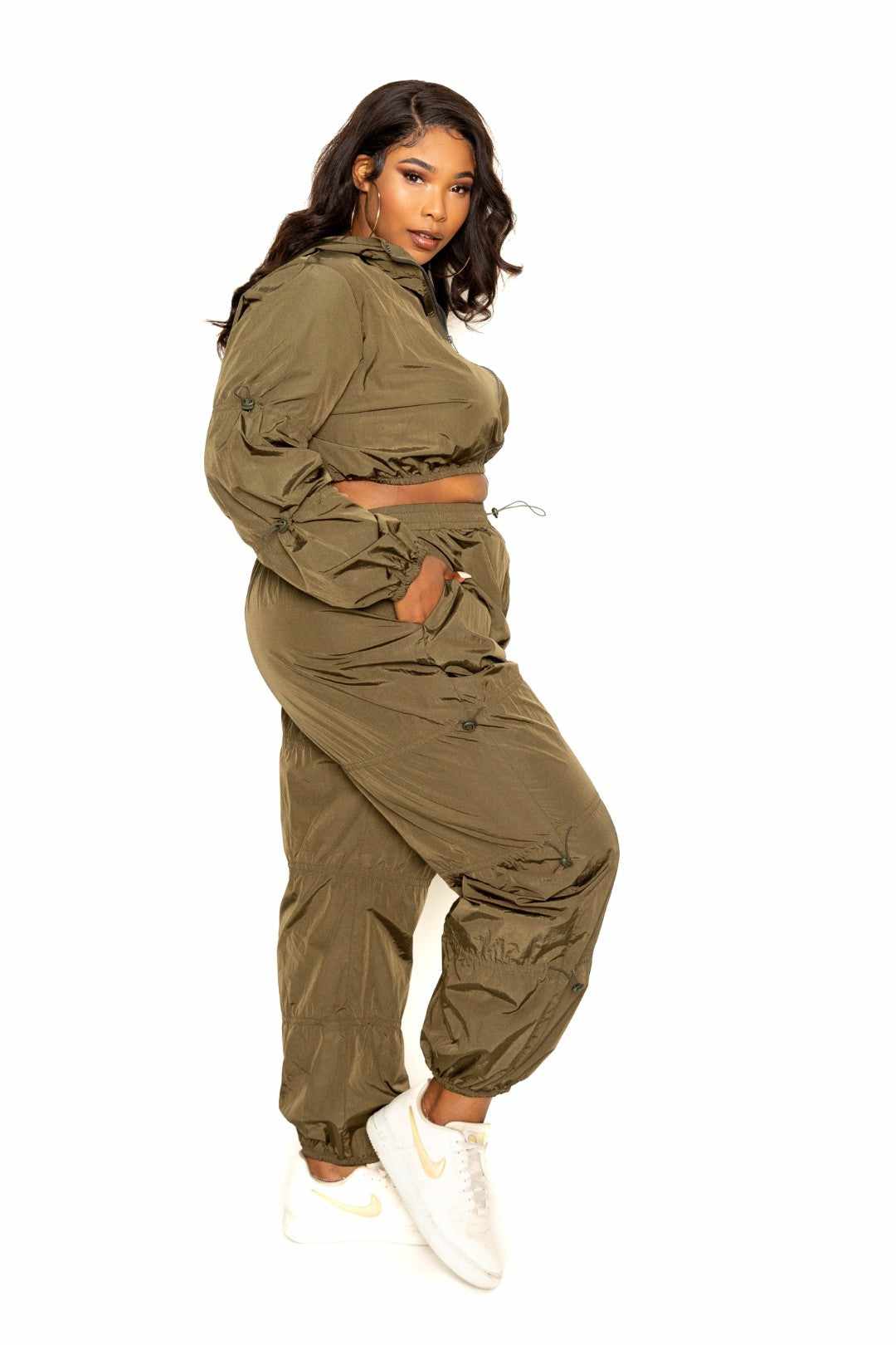 Plus size olive zip up set with cord lock detail, perfect for a stylish and warm look. Available in 1XL, 2XL, and 3XL.