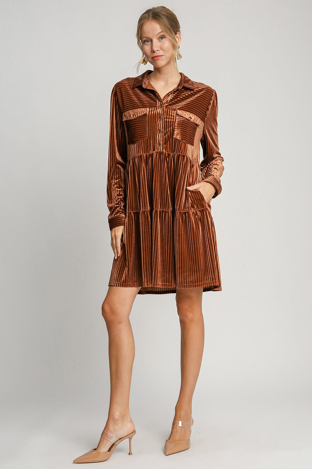 Copper texture tiered collared long sleeve dress with pockets and buttons, made of slightly stretchy polyester-spandex blend.