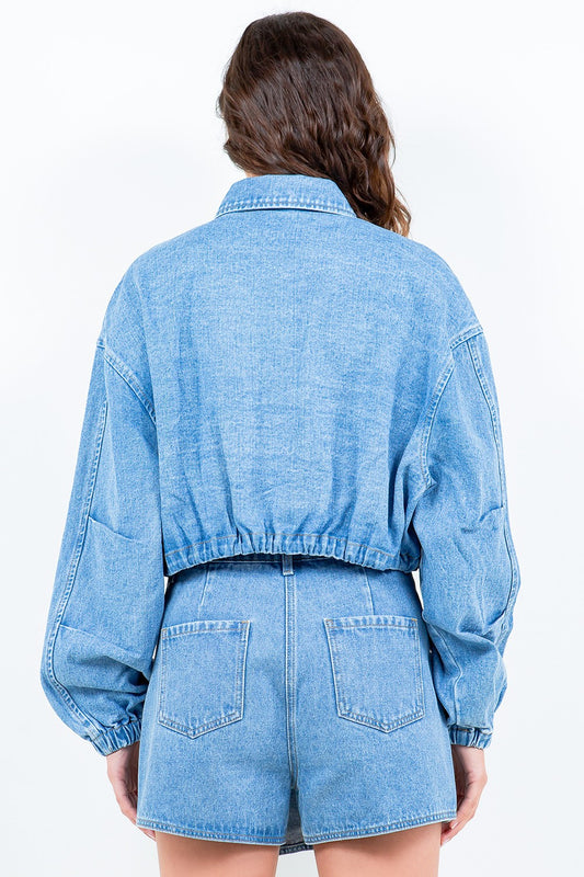 Woman wearing American Bazi drawstring waist crop denim jacket, showing back view with elastic banded hem and cuff.