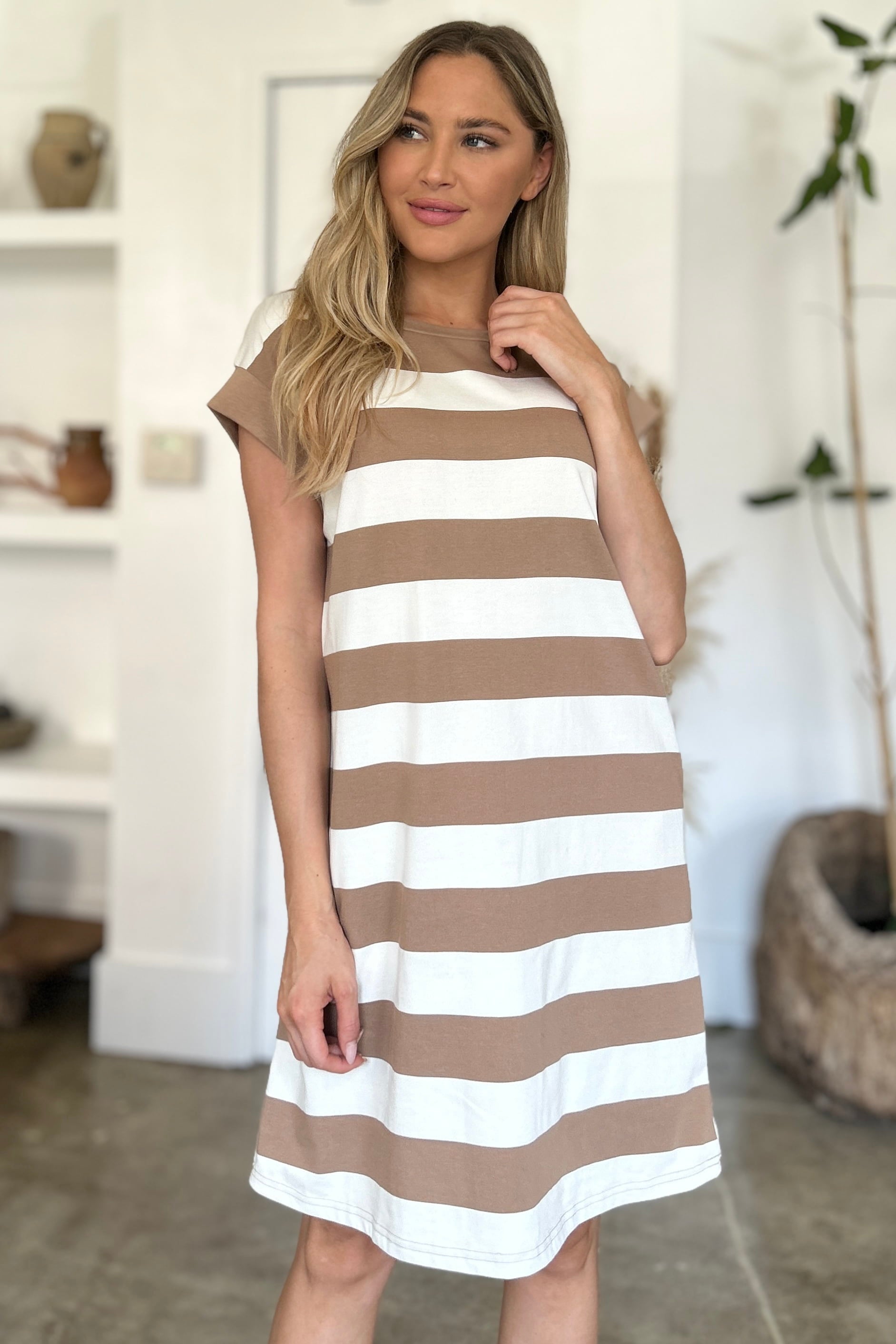 Basic Bae striped round neck cap sleeve mini dress in beige and white, featuring a comfortable, slightly stretchy fit.