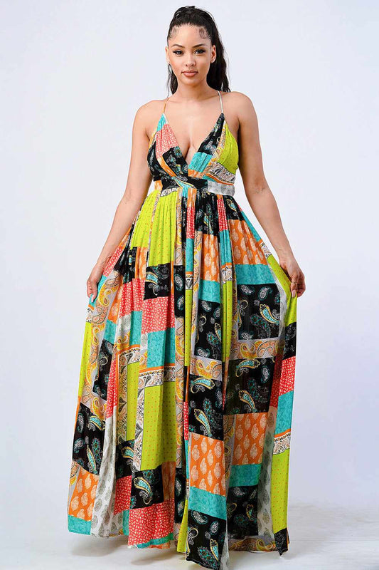 Woman wearing colorful Boho Chic Crossed Back Maxi Dress with a deep V-neck and sleeveless design