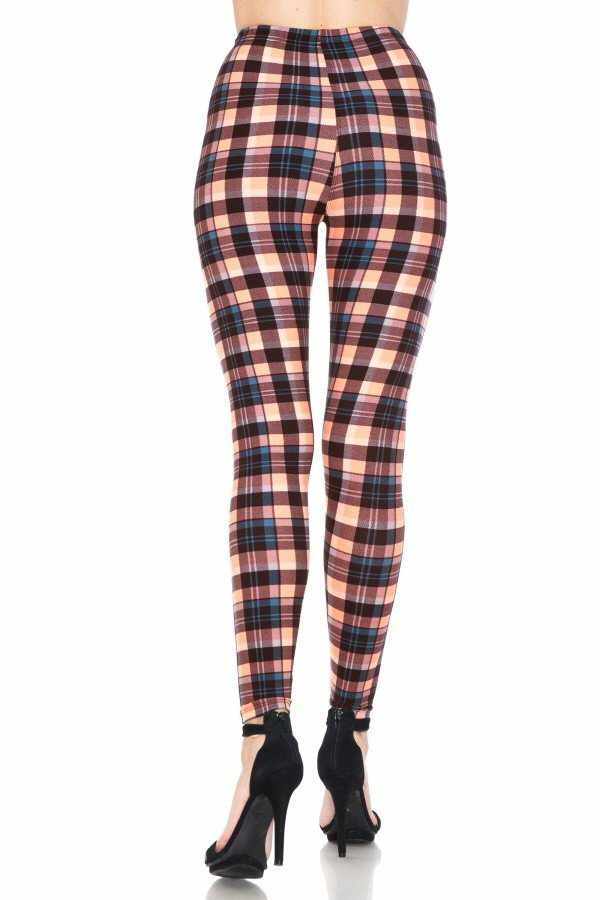 Multi-printed high-waisted leggings with an elasticized waistband, featuring a colorful plaid design and a stretchy fit.