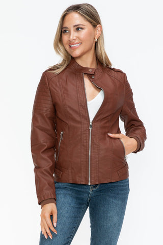 Woman wearing a Brandy PU leather biker jacket with side zip pockets, featuring a basic style and normal thickness.