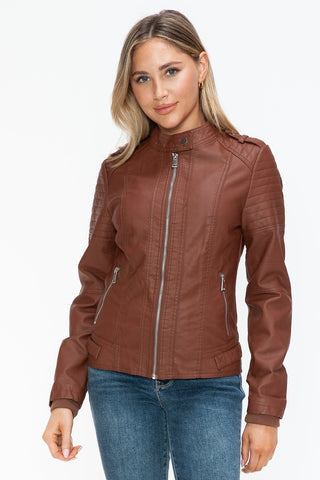 Woman wearing Brandy PU leather biker jacket with side zip pockets, basic style, pleather, and normal thickness.