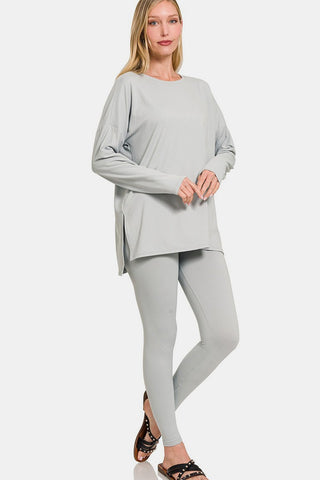Woman wearing a gray brushed microfiber top and leggings lounge set with trendy slit, perfect for versatile and flattering style.