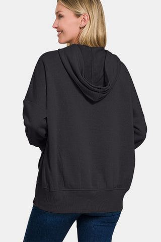 Zenana Half Snap Long Sleeve Hoodie with Kangaroo Pocket in black, showcasing back view and hood detail, perfect for casual wear.