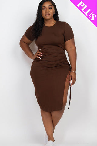 Plus size model wearing brown drawstring midi dress with ruched side slit, showcasing Jersey fabric fit.