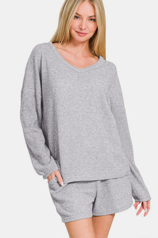 Gray V-neck long sleeve ribbed top and shorts set for women, featuring a cozy two-piece look with slightly stretchy fabric.