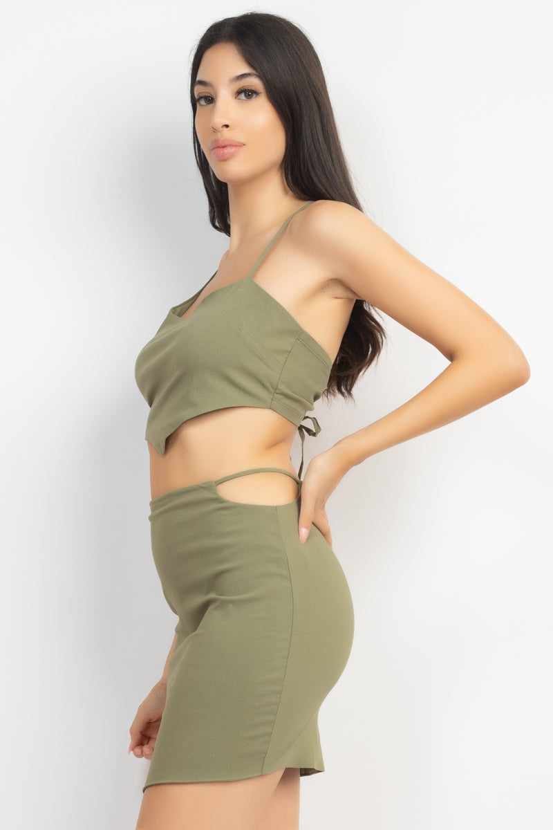 Olive asymmetrical cross back top and skirt set with drawstring tie and side cutout, sleeveless design, perfect for stylish summer wear.