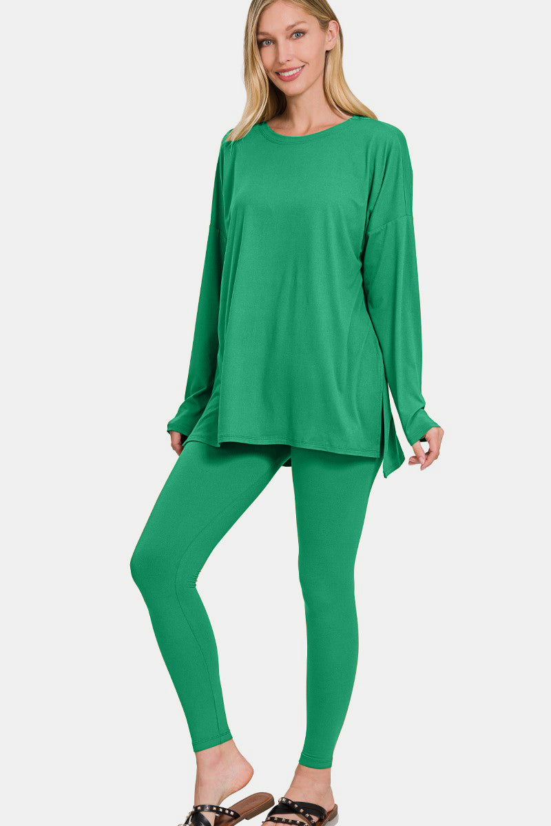 Woman wearing a green full-size brushed microfiber lounge set with long sleeve top and leggings, featuring a trendy slit detail.