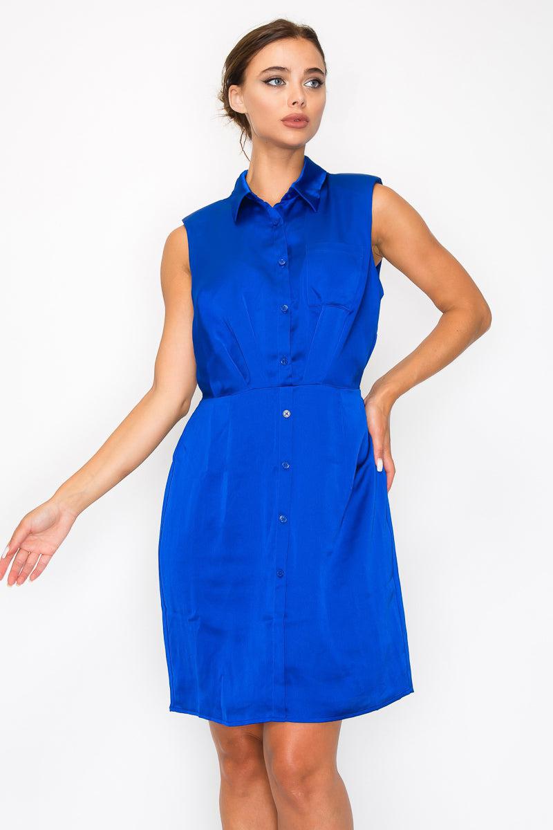 Royal blue sleeveless button-down pleated shirt dress with collar, cinched waist, and chest pocket. Chic knee-length summer fashion.