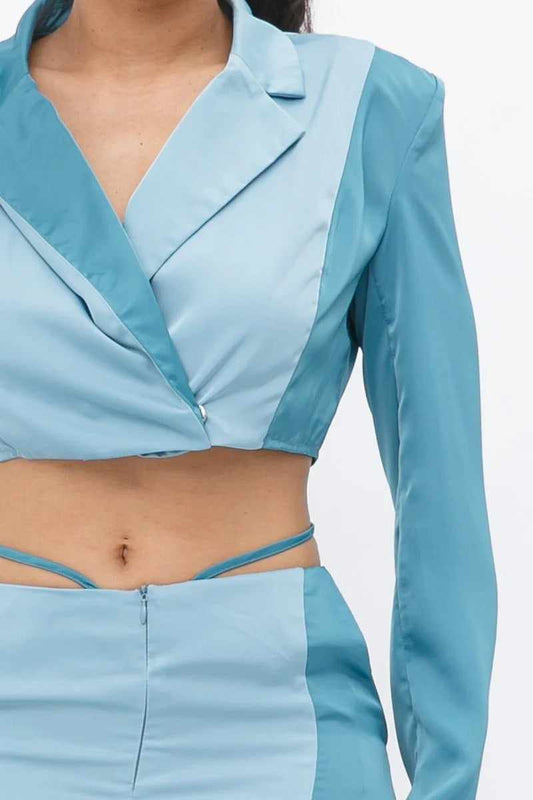 Stylish colorblock crop blazer and low rise wide leg pant set in blue, featuring a comfortable polyester-spandex blend.