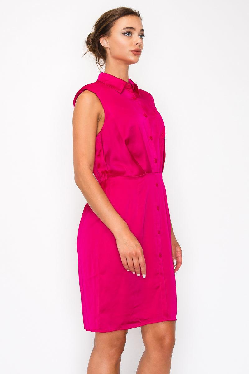 Fuchsia button-down pleated shirt dress with collar, sleeveless design, and cinched waist, featuring knee length and chest pocket.