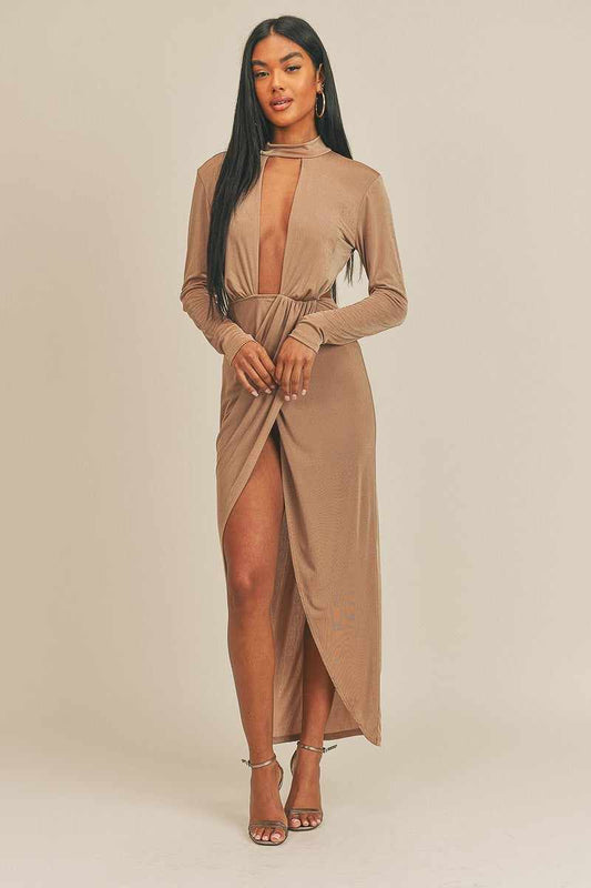 Woman in pecan brown open front dress made of polyester and spandex, showcasing elegant long sleeves, standing on light background.