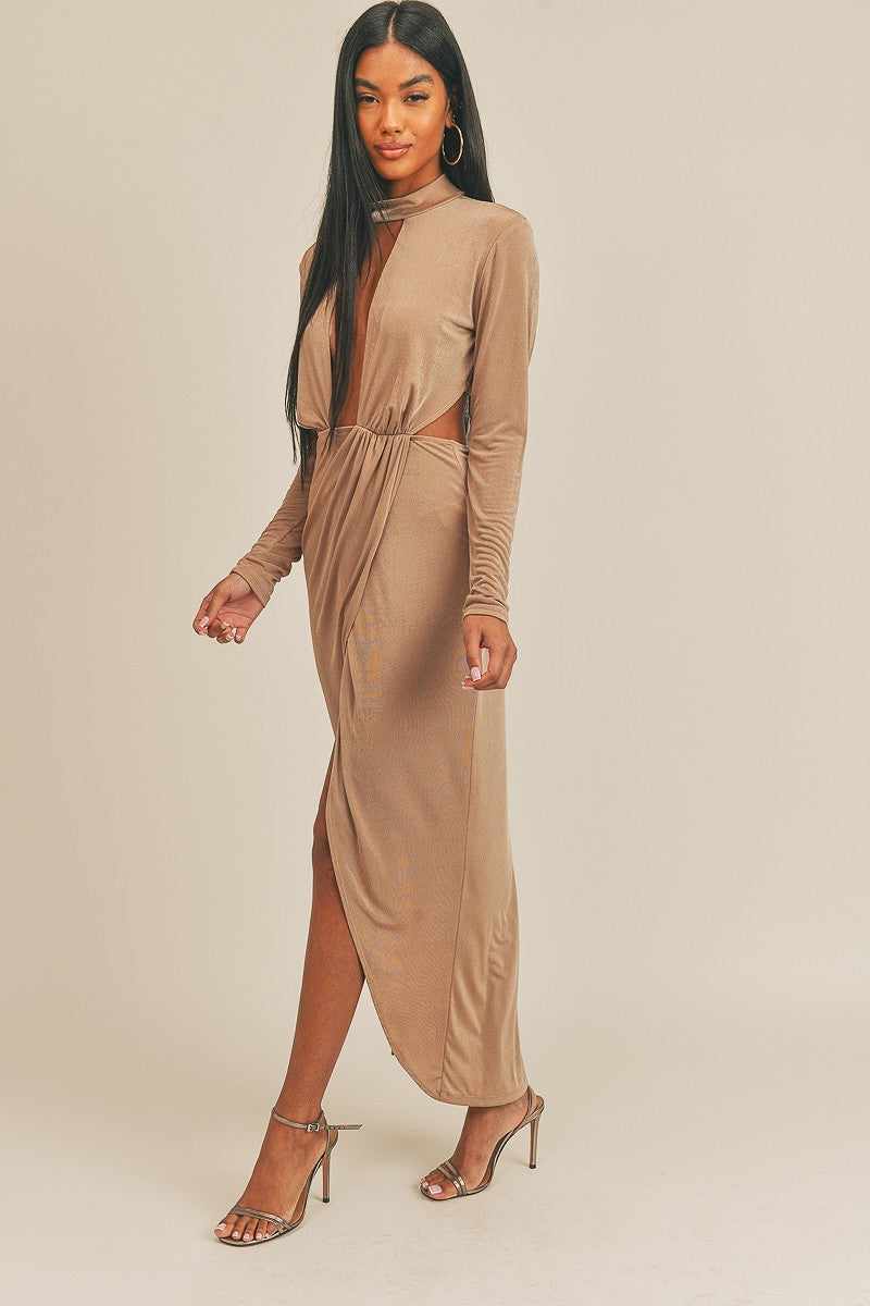 Pecan brown open front dress made in USA featuring long sleeves and side cutouts, worn by a woman standing in heels.