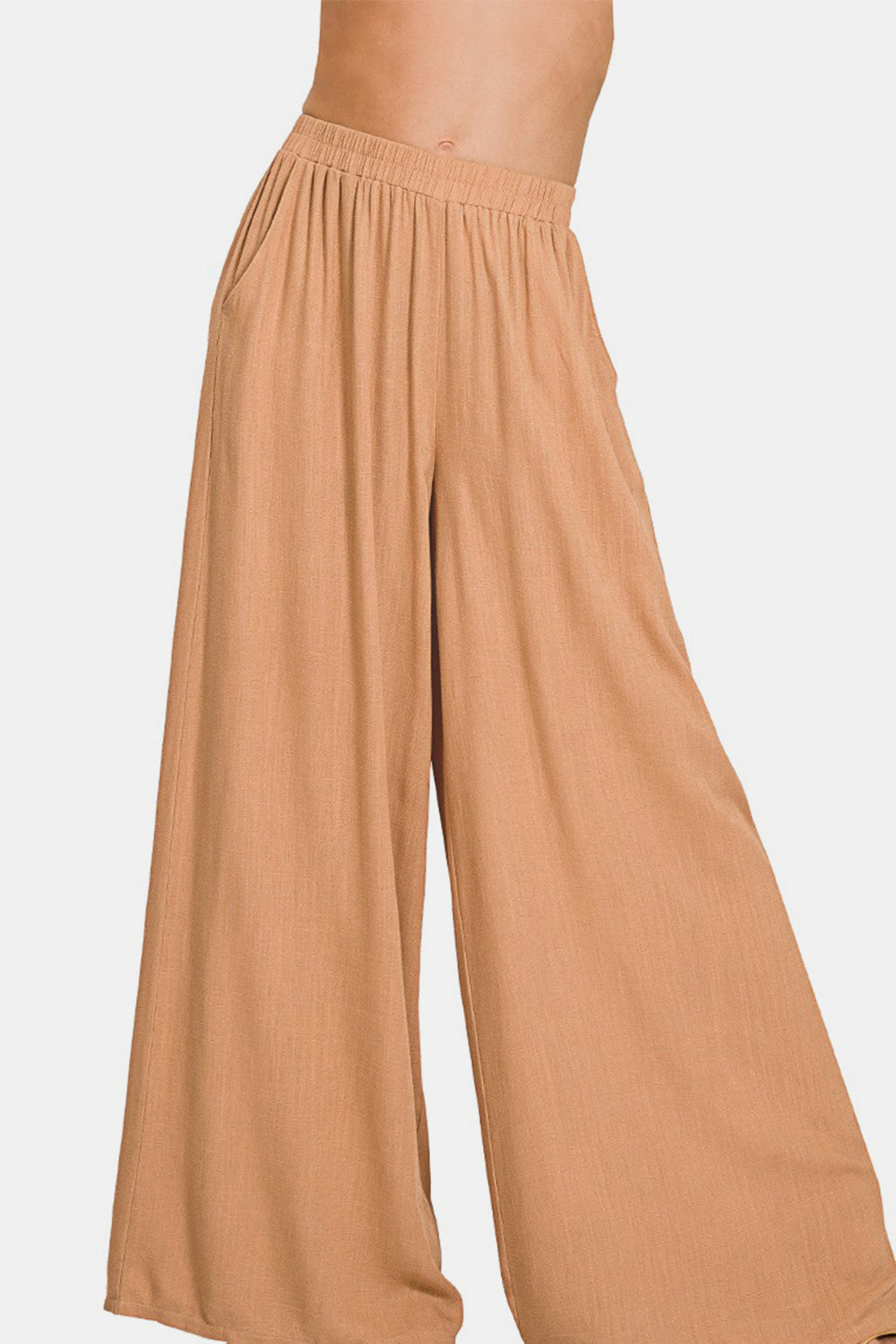 Pleated linen blend wide leg pants in beige, featuring a basic style and opaque fabric, composed of 25% linen and 75% rayon.