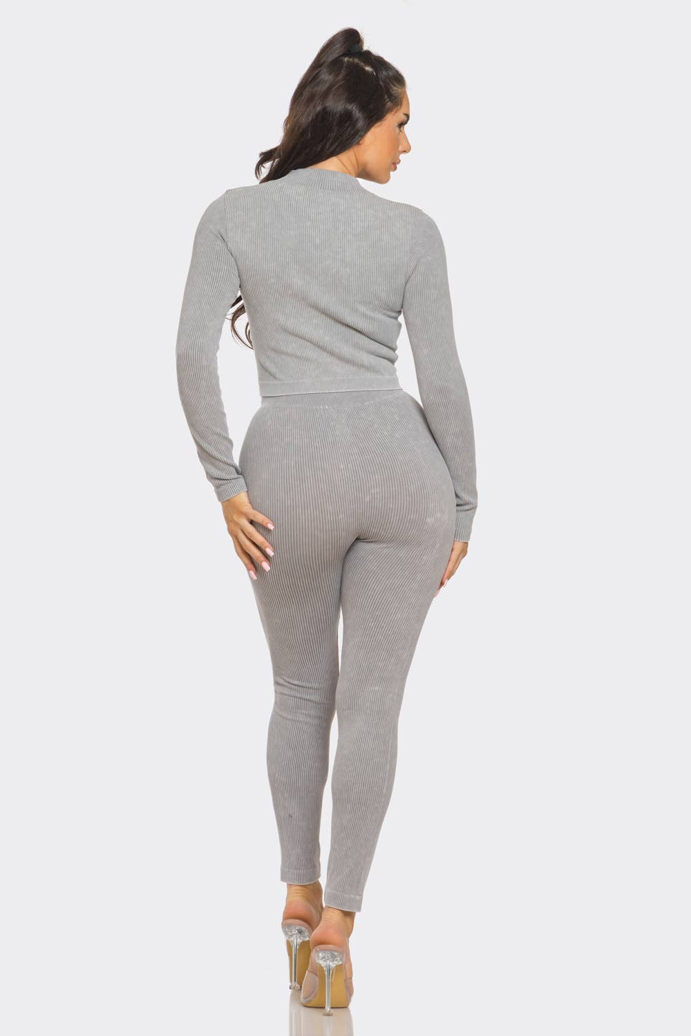 Gray washed seamless rib zip-up jacket and leggings set with mock neck and long sleeves, back view on model.