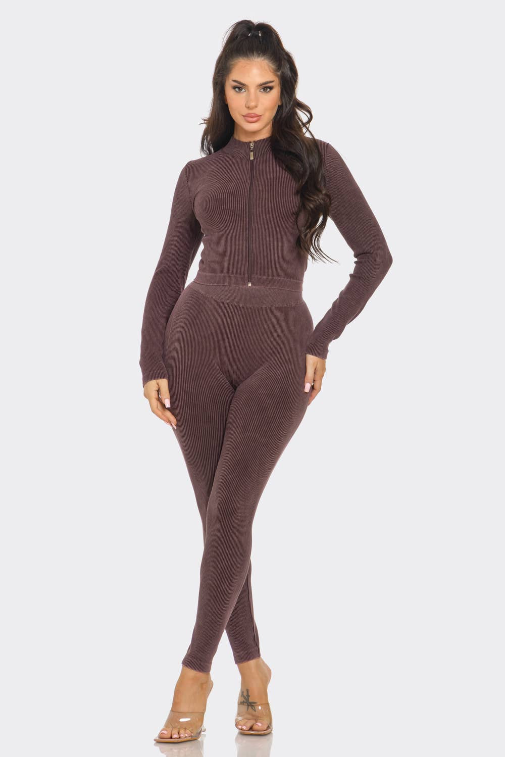 Woman wearing washed seamless rib zip up jacket and leggings set, brown mock neck, long sleeves, stylish and comfortable wear.