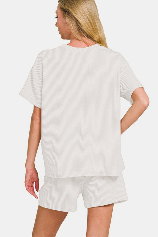 Ribbed short sleeve T-shirt and shorts set in white, featuring a relaxed fit for chic casual style.