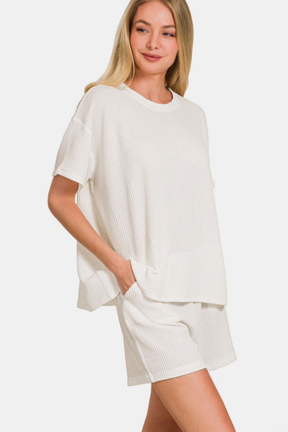 Ribbed short sleeve T-shirt and shorts set in white, featuring a round neckline and relaxed fit for effortless chic style.