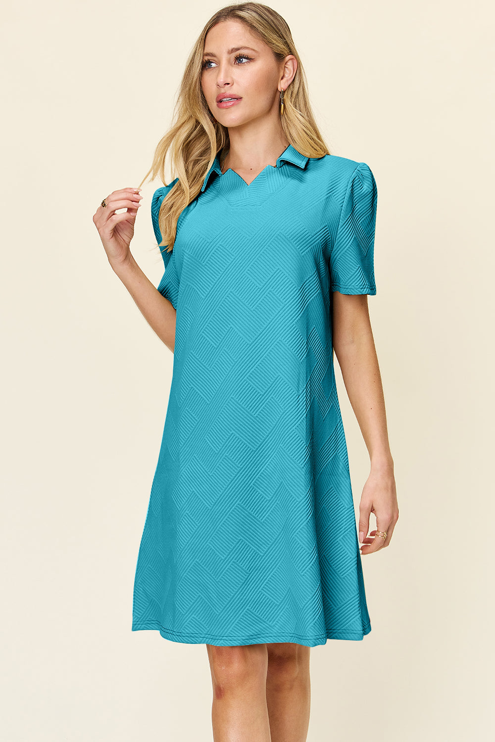 Teal texture collared neck short sleeve dress showcasing basic style with slightly stretchy fabric.