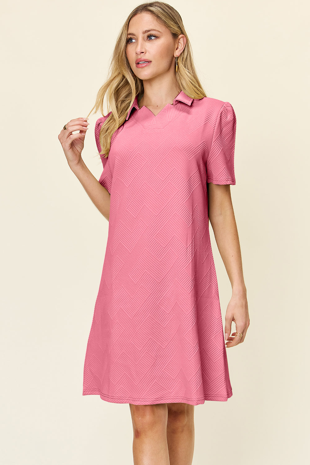 Pink texture collared neck short sleeve dress in polyester spandex blend, featuring a basic style with slight stretch.