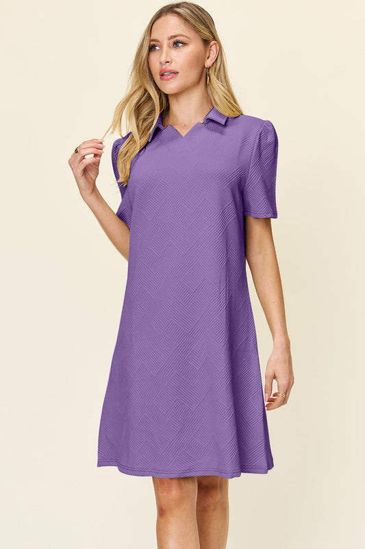 Purple texture collared neck short sleeve dress, slightly stretchy polyester blend, worn by model, basic style, opaque fabric