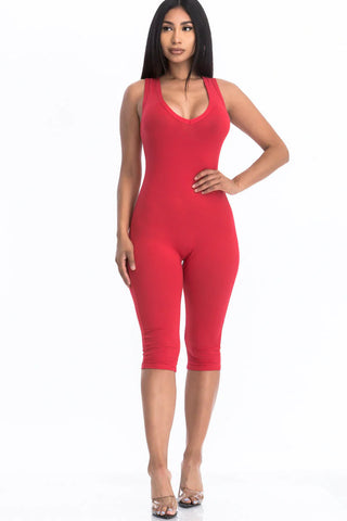 Red sleeveless racer back capri jumpsuit for women in soft jersey fabric, perfect for summer style, casual wear, or workouts.