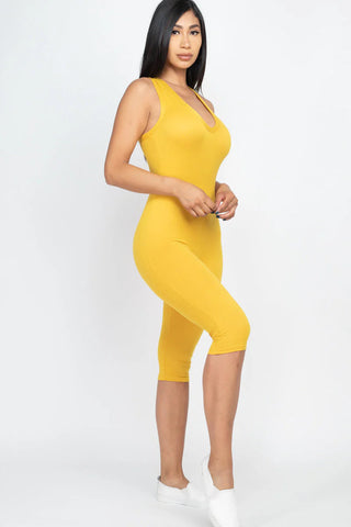 Yellow racer back capri jumpsuit for women, sleeveless and lightweight, perfect for summer casual wear and workouts.
