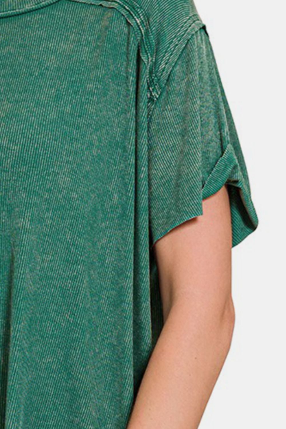 Green washed ribbed short sleeve top with moderate stretch, featuring a basic style made of 93% rayon and 7% spandex.