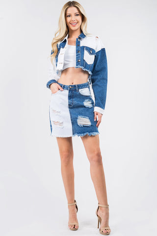 Woman modeling contrast patched frayed distressed denim skirt with jacket, showcasing trendy, laid-back style with raw hem and pockets.