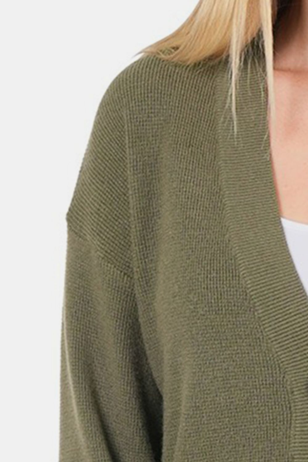 Olive green button-up V-neck cardigan with dropped shoulders, featuring a moderate stretch, made from viscose, nylon, and polyester.