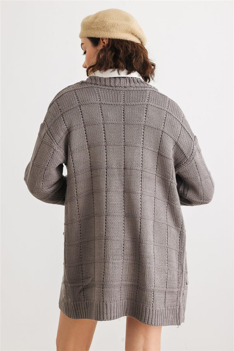 Woman wearing heather charcoal knit long sleeve cardigan with open front and two pockets, showcasing cozy casual style.